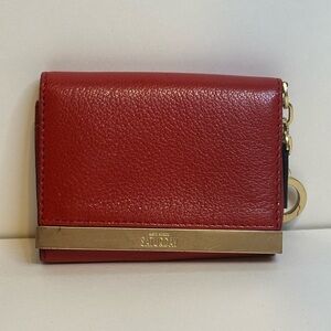 Kate Spade Red and Gold Wallet Sleek Design